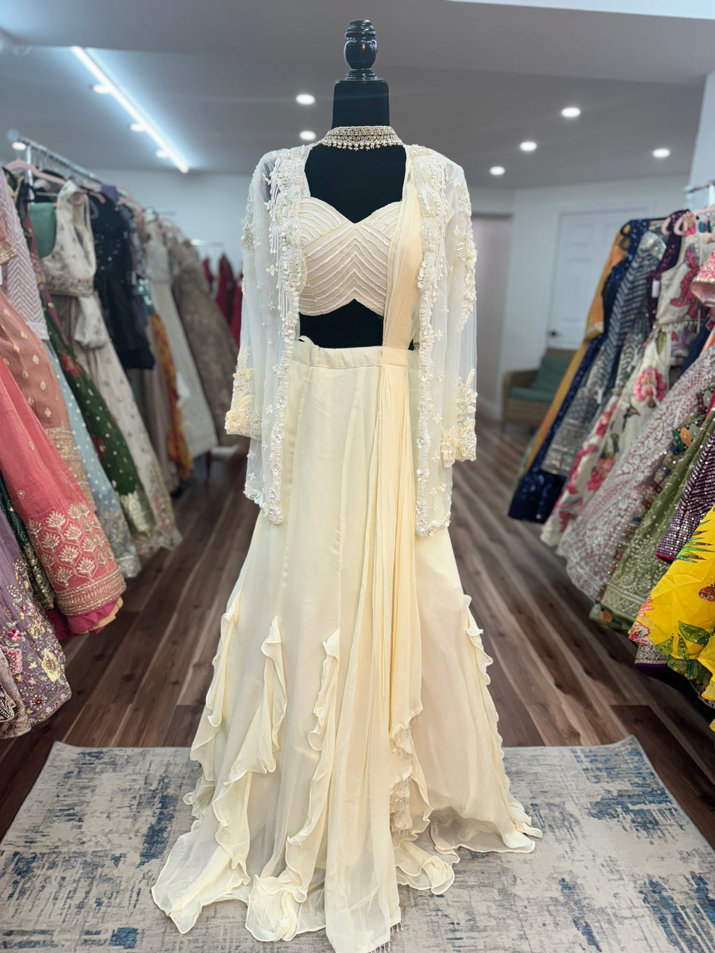 Mermaid cut skirt with ruffles and hand work jacket and drape attached