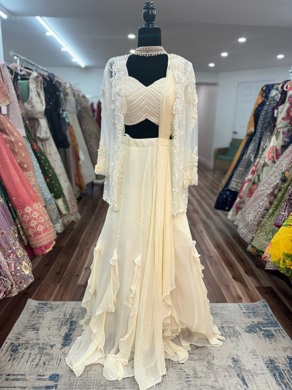 Mermaid cut skirt with ruffles and hand work jacket and drape attached