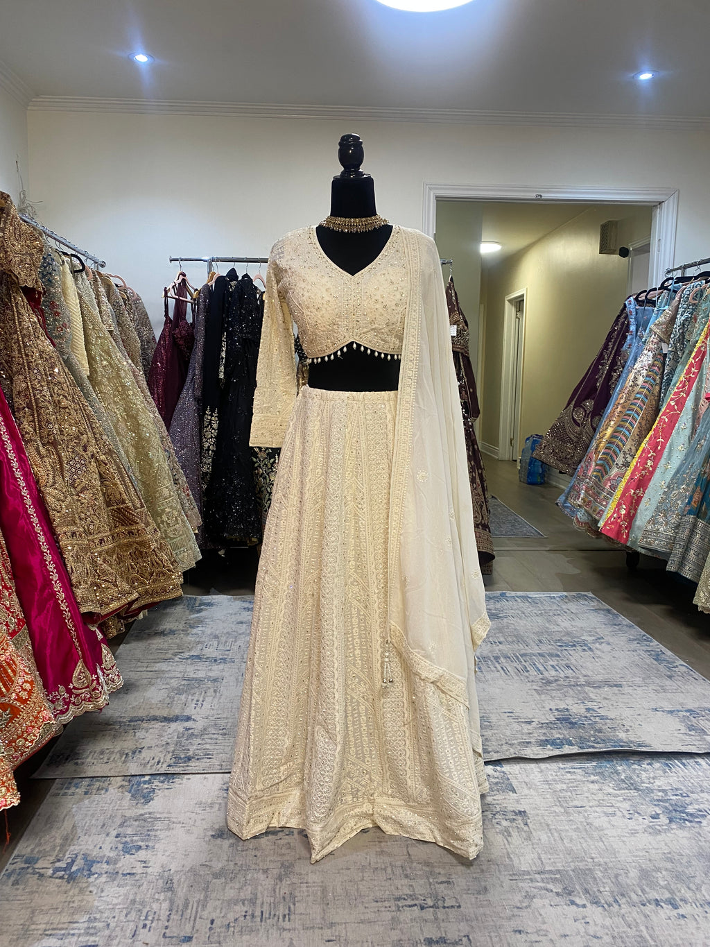 Full sleeve cream color lehenga choli