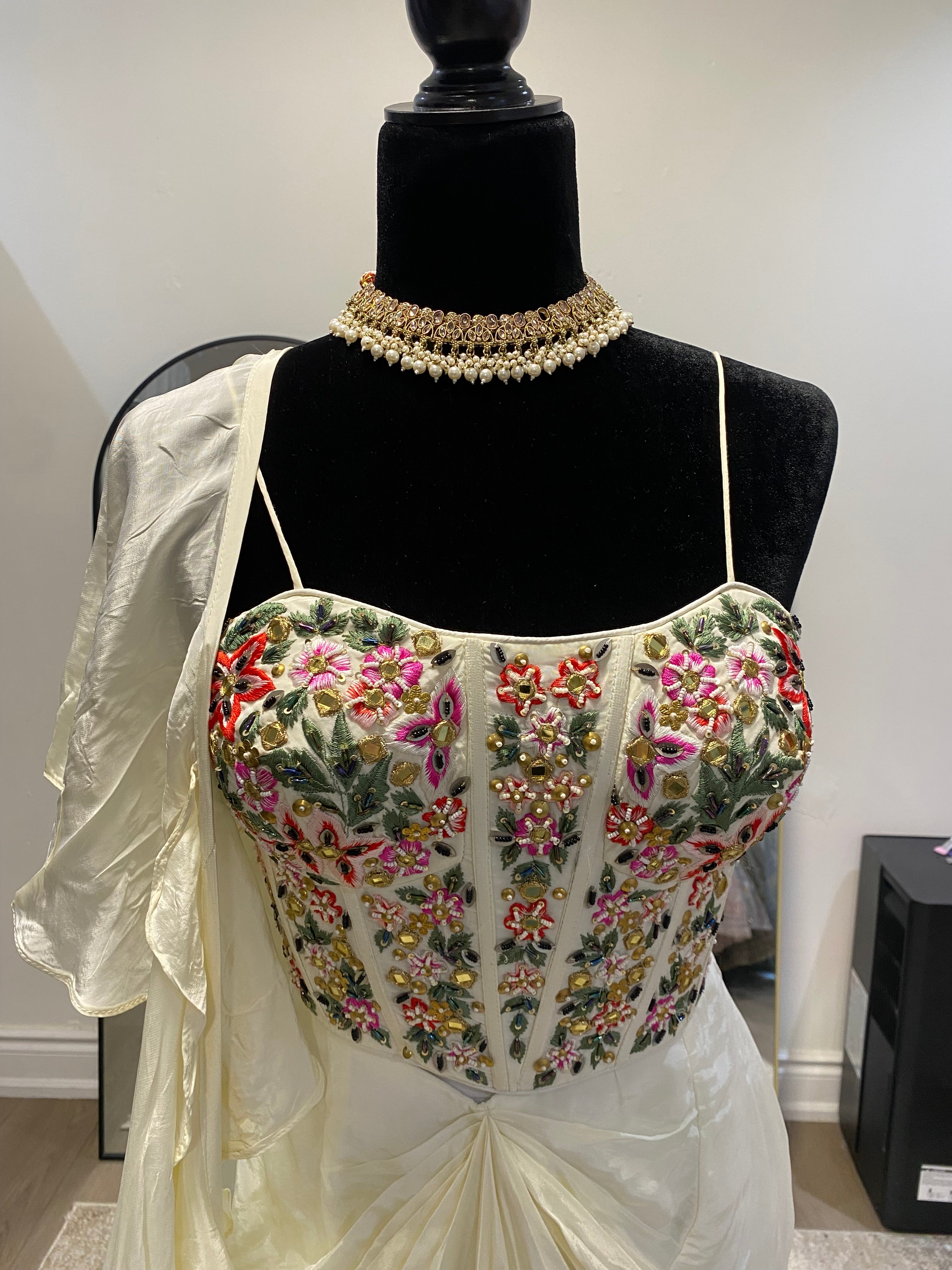 Hand work corset top with pleated skirt and ruffle dhupatta